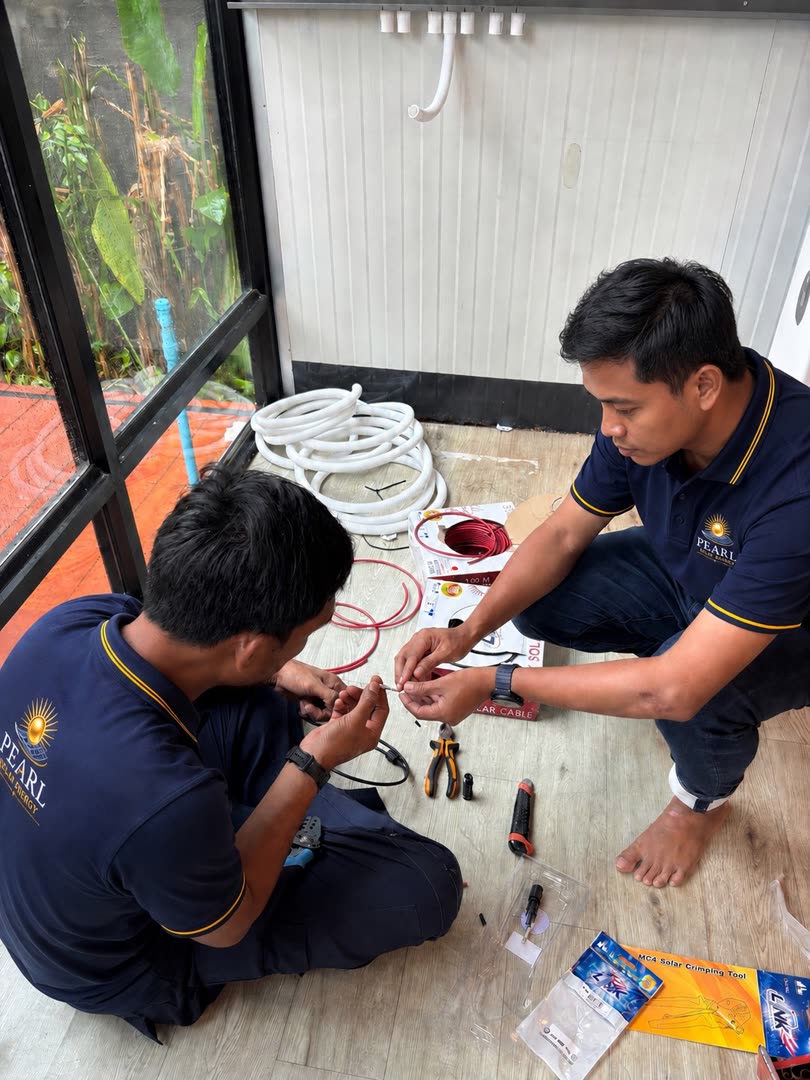 Crimping MC4 connectors with purpose-made tools, farm project in Phuket